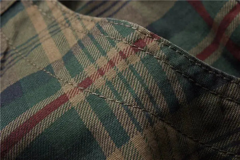 Men's plaid shorts by Simples Market; green and brown plaid fabric close-up