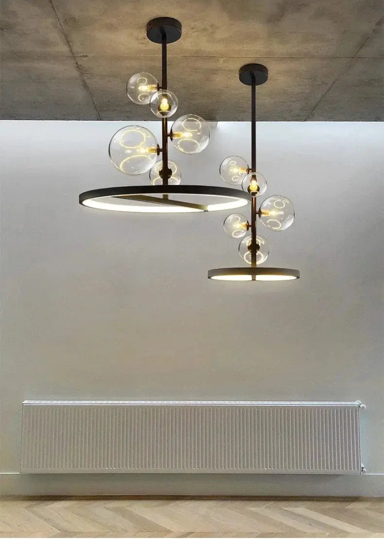 Modern Art Glass Chandelier with circular LED rings and glass bubble globes, black metal frame