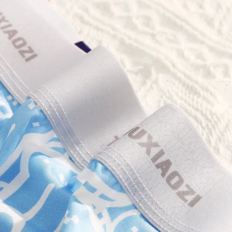 Simples Market women's seamless boyshort underwear in light blue patterned fabric with gray waistband