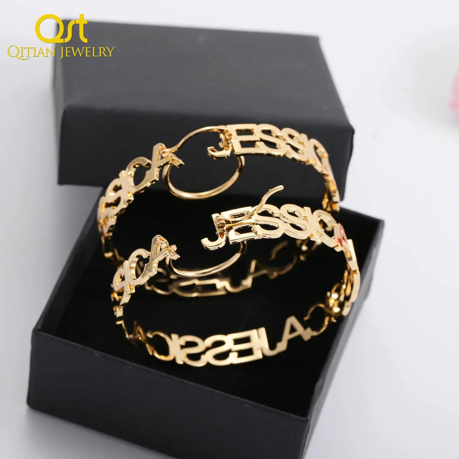 Gold-tone custom name hoop earrings for women, large circular letter design, stainless steel pair