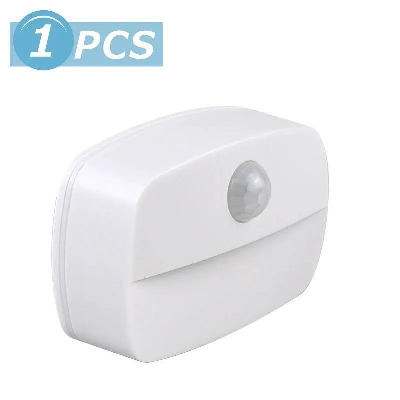 Wireless LED motion sensor night light, white plastic plug-in lamp, 1 piece