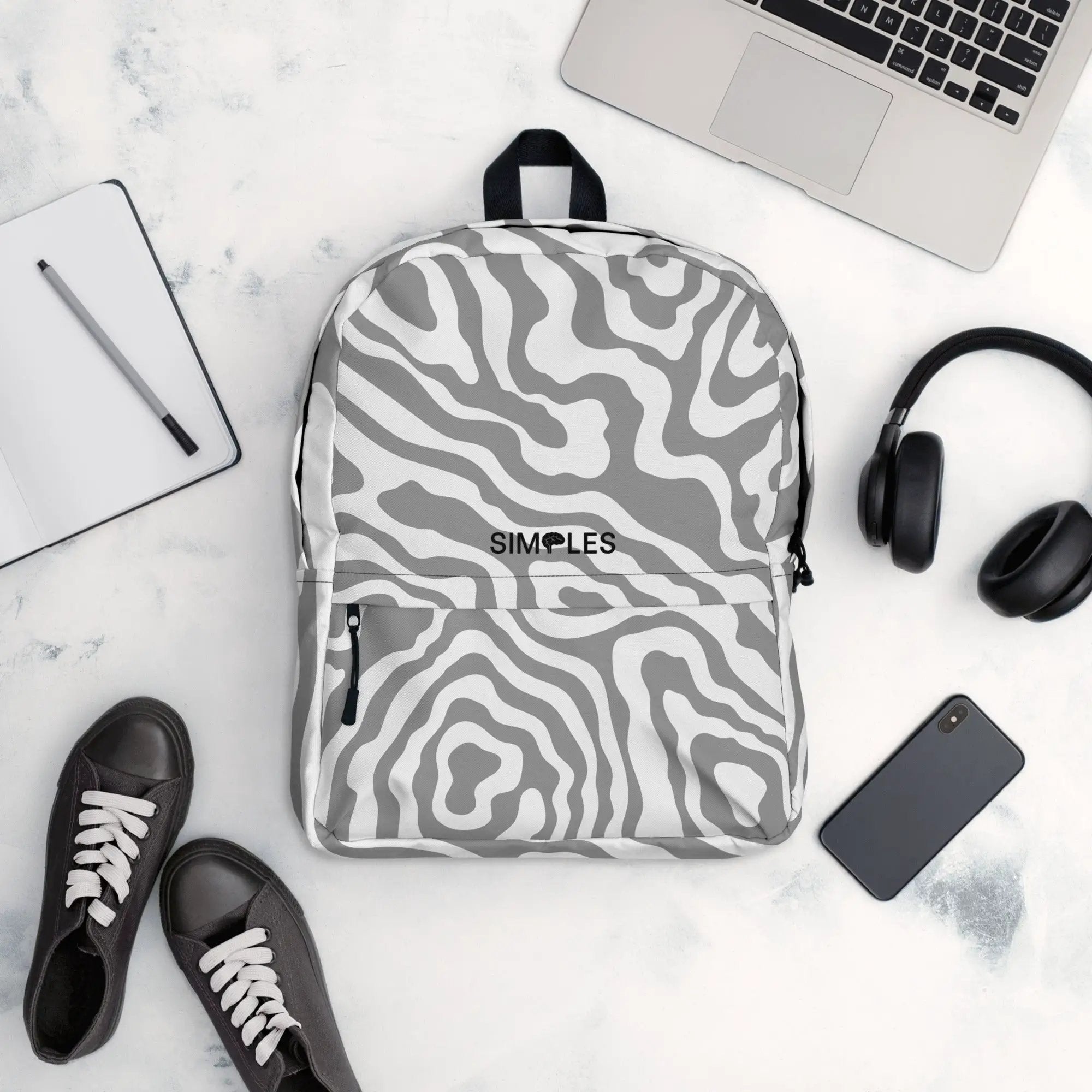 Backpack with gray and white zebra-print pattern by Simples Market