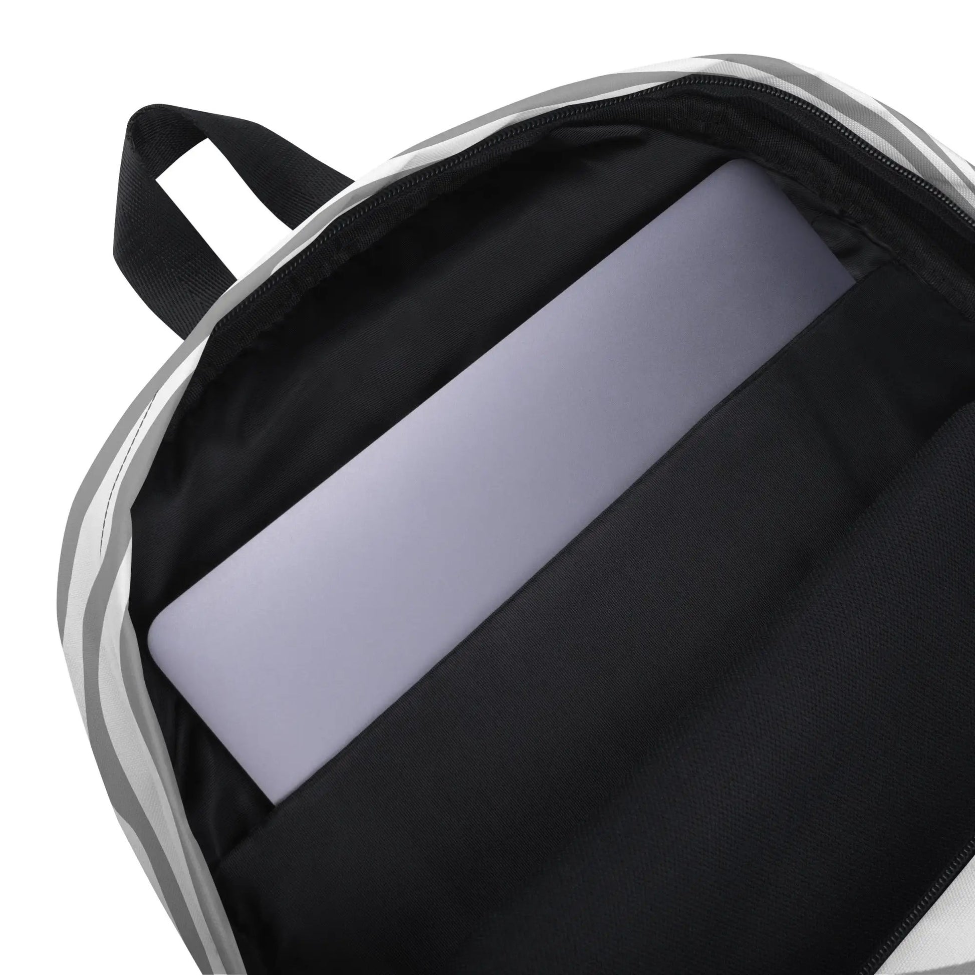 Backpack with black exterior and lavender interior, close-up of top zipper and strap.