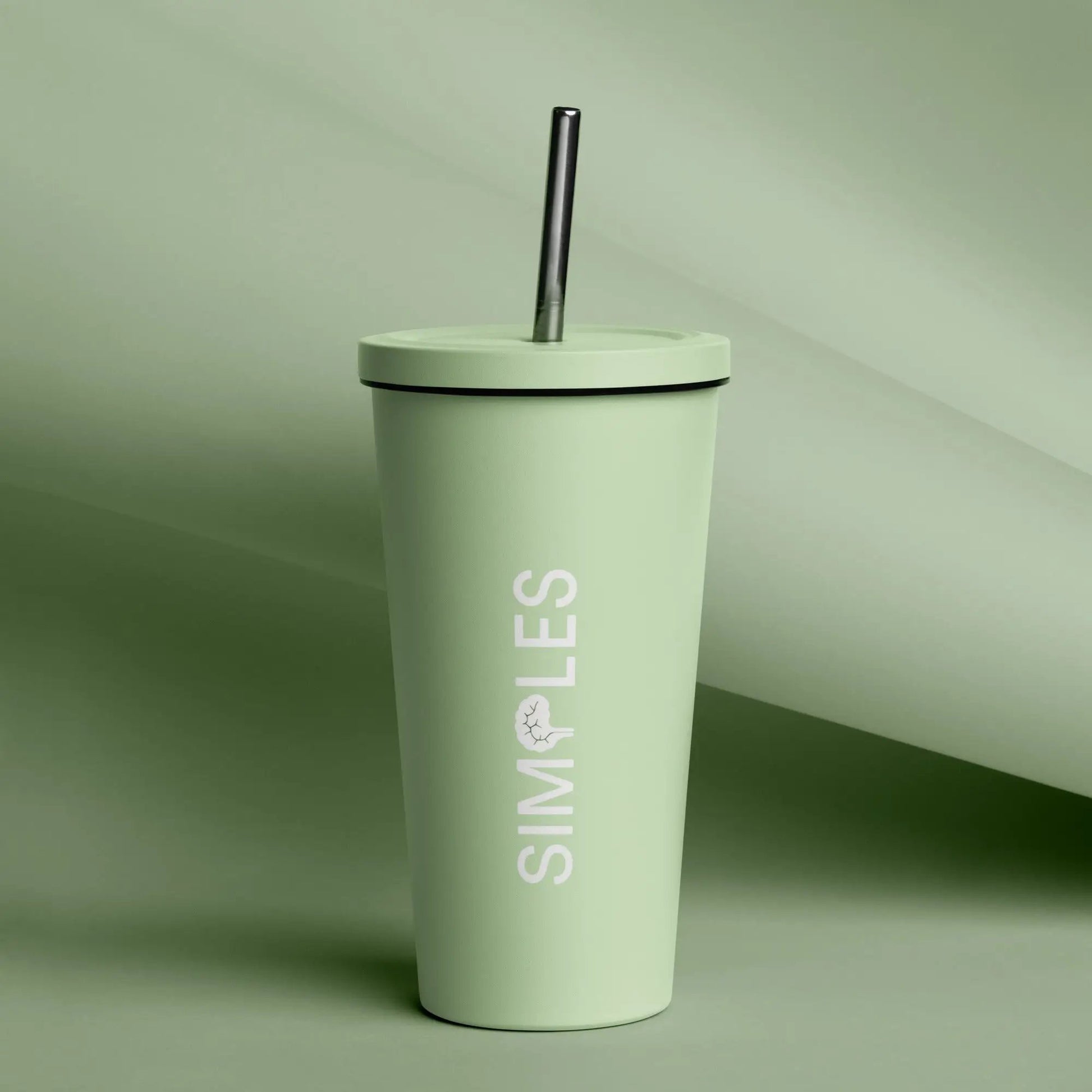 Insulated tumbler with straw and lid by Simples Market in mint green