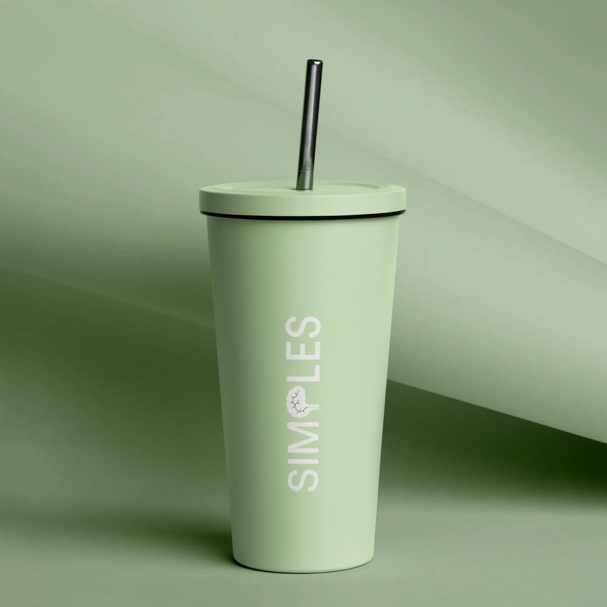 Insulated tumbler with straw and lid by Simples Market in mint green