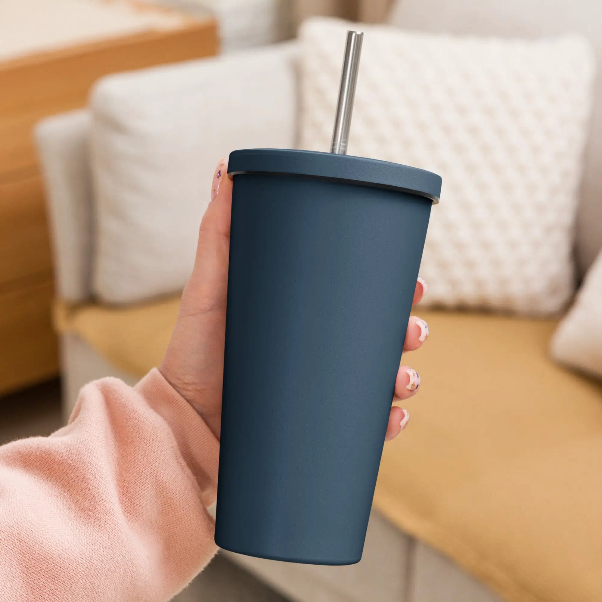 Insulated tumbler with straw, dark blue matte finish.