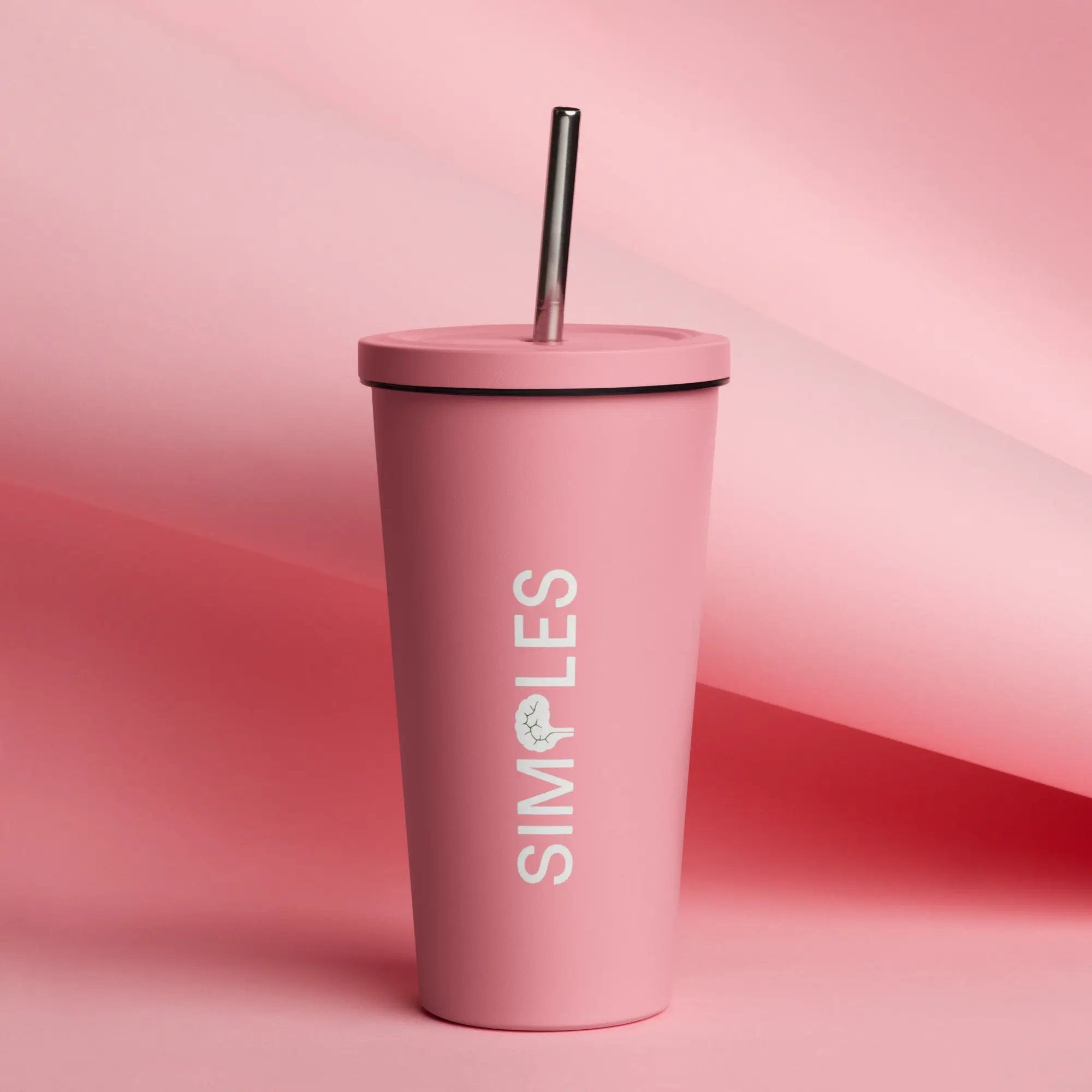 Insulated pink tumbler with metal straw by Simples Market