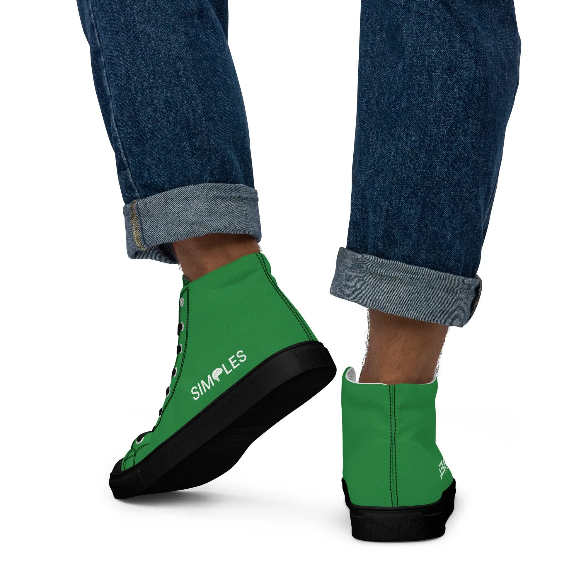 Pair of men's high-top canvas shoes by Simples Market in green with black soles