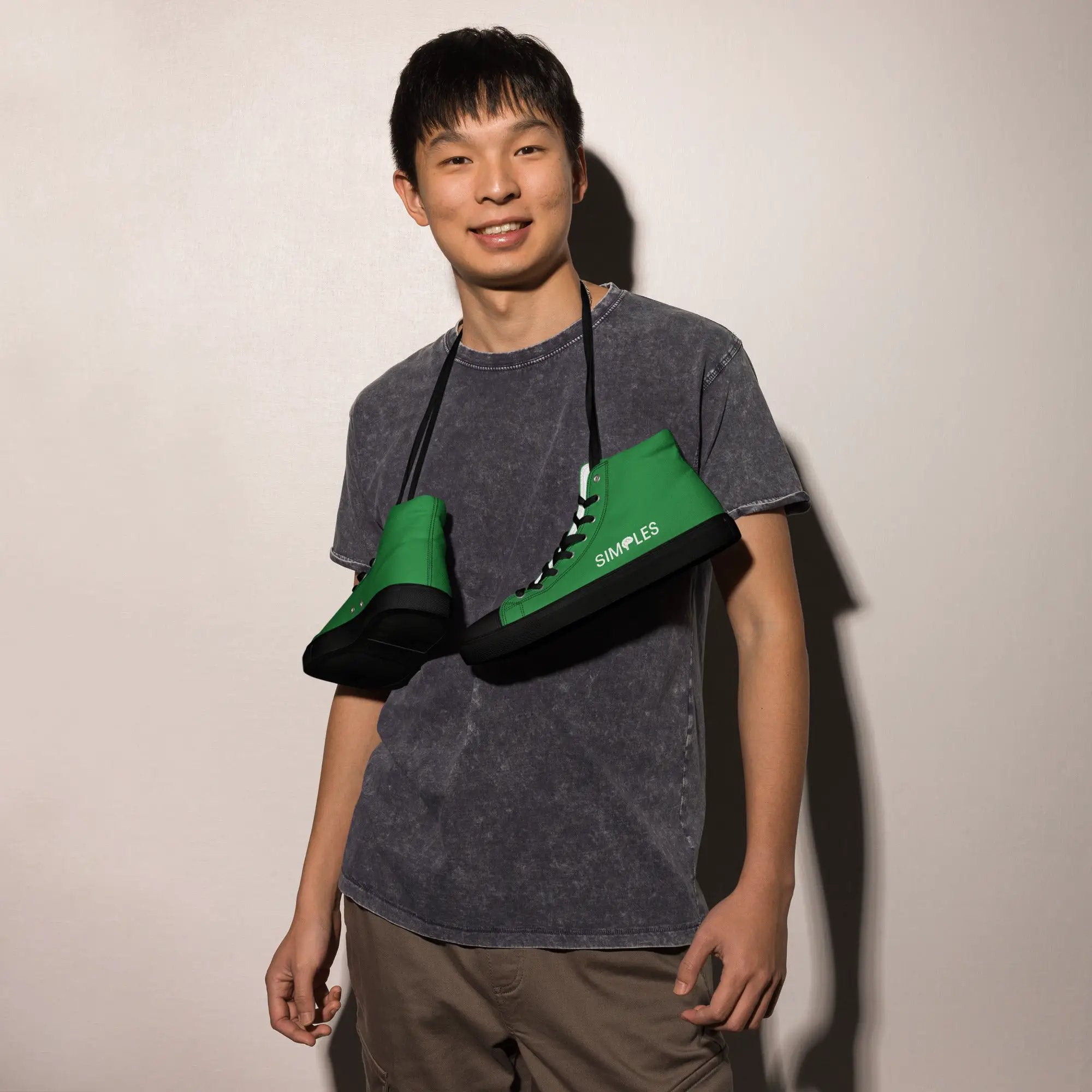 Men's high-top canvas sneakers by Simples Market in green with black sole.