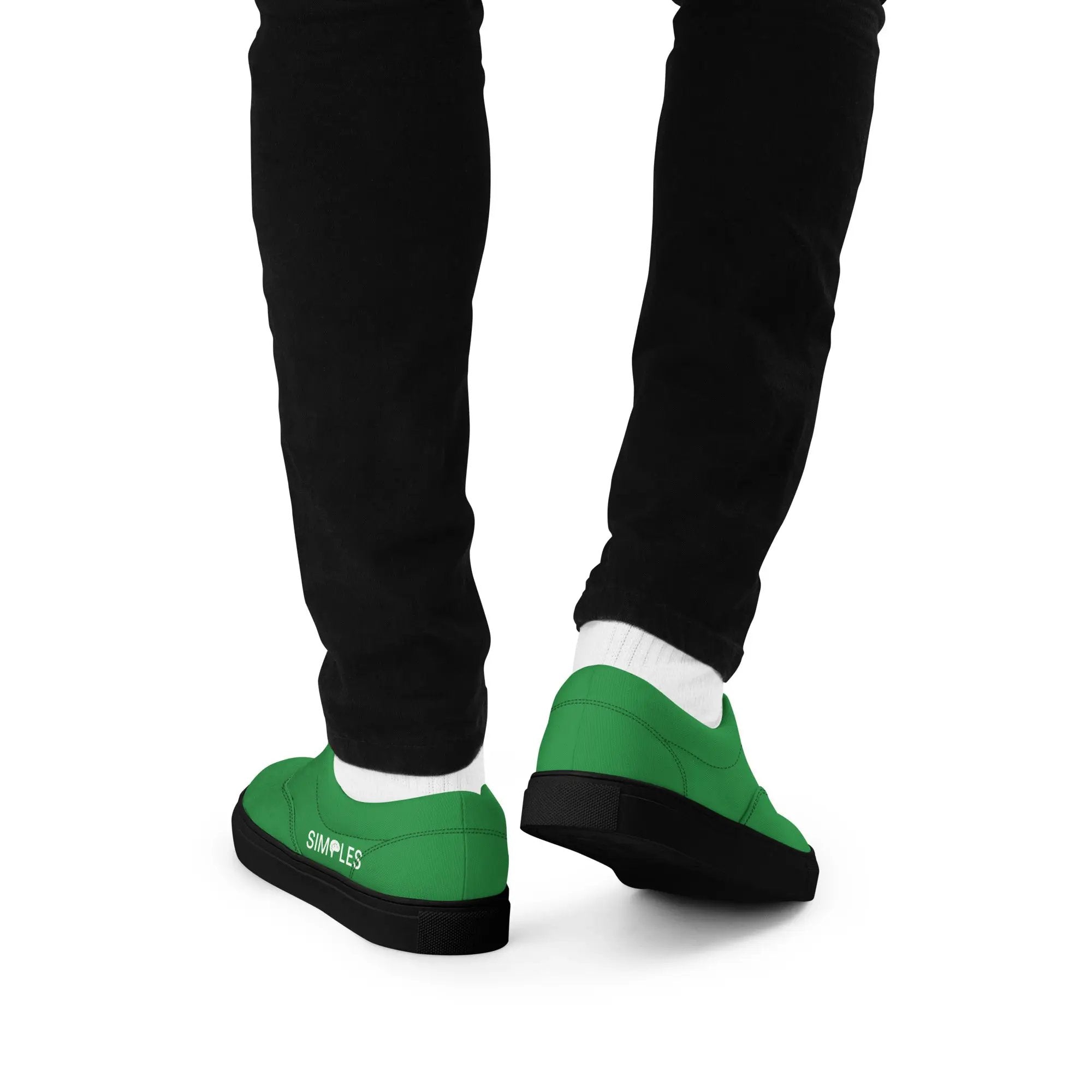 Pair of men’s lace-up canvas shoes in green with black sole; Simples Market logo visible.