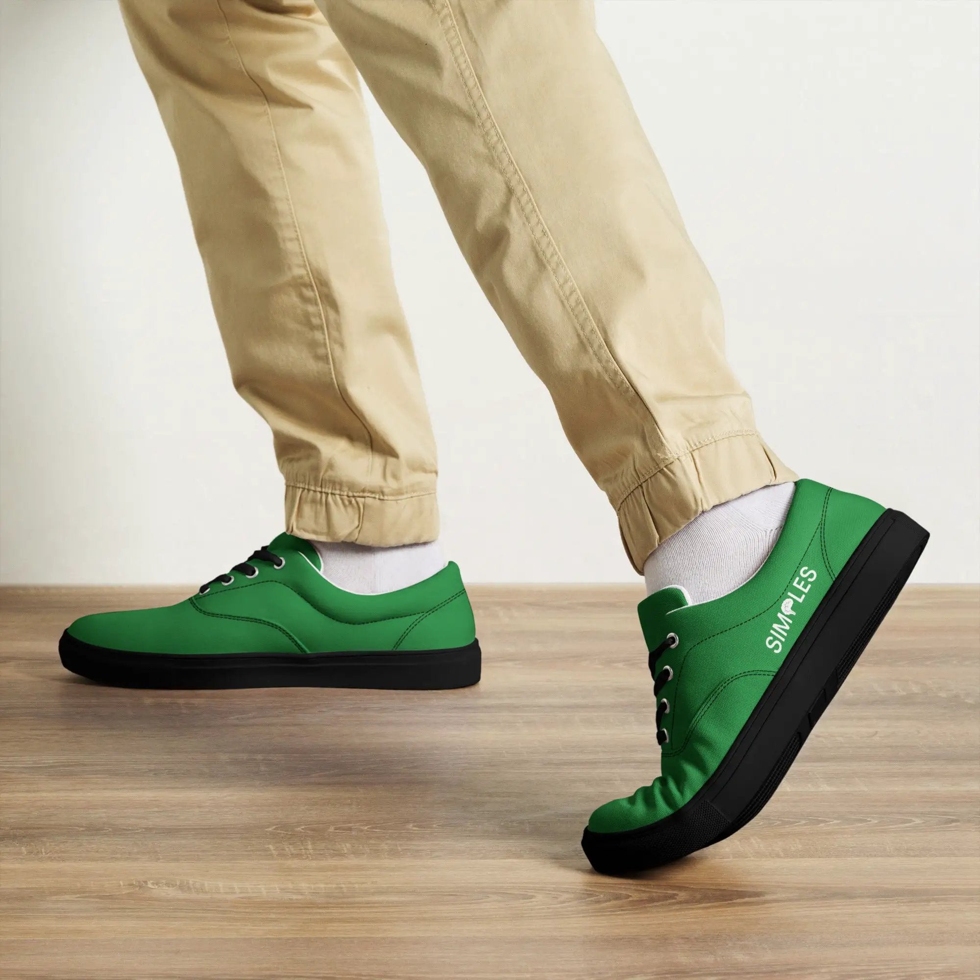Men’s lace-up canvas shoes in green by Simples Market; pair shown.