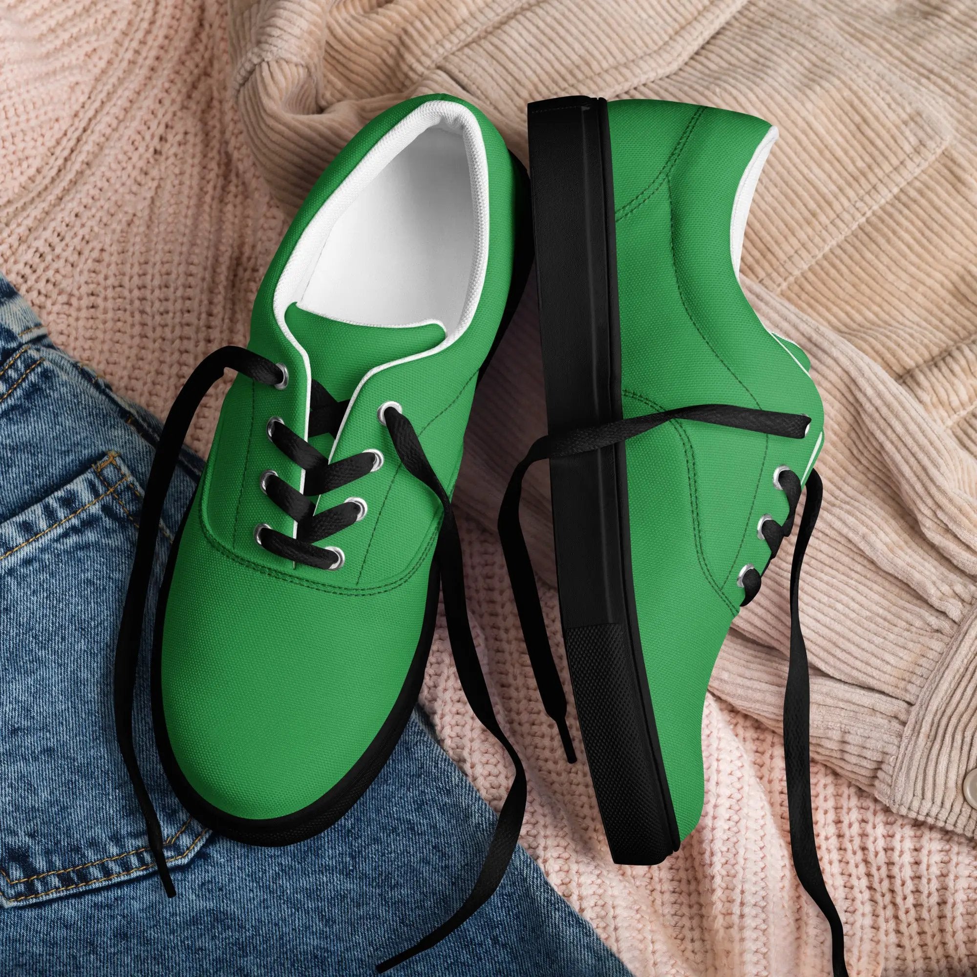 Pair of men's green canvas lace-up shoes for casual wear