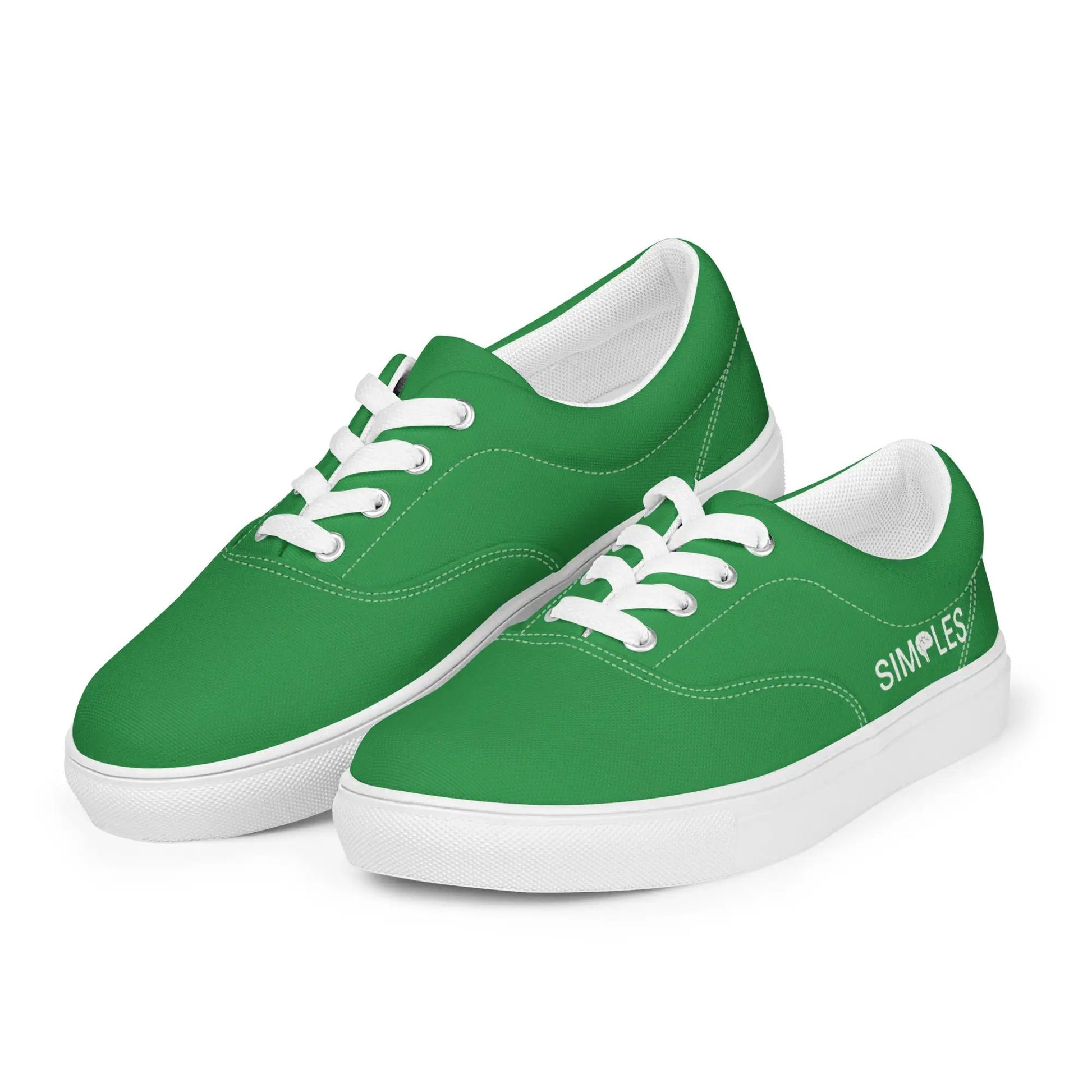 Pair of men's green lace-up canvas shoes with white laces and white soles, Simples Market.