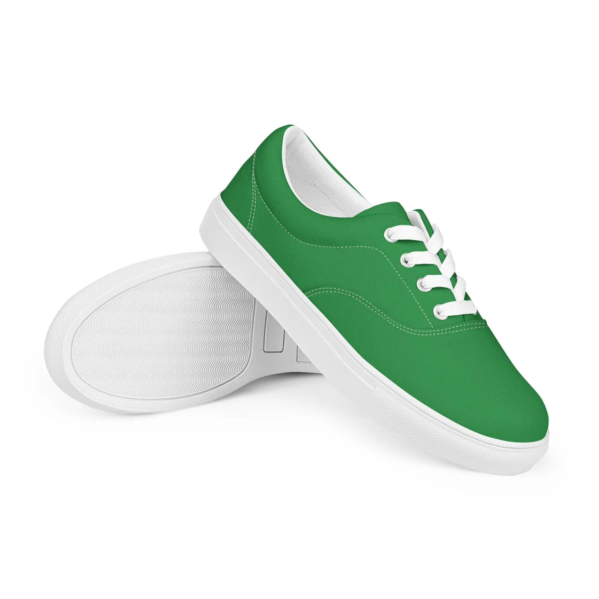 Pair of green canvas lace-up sneakers with white soles