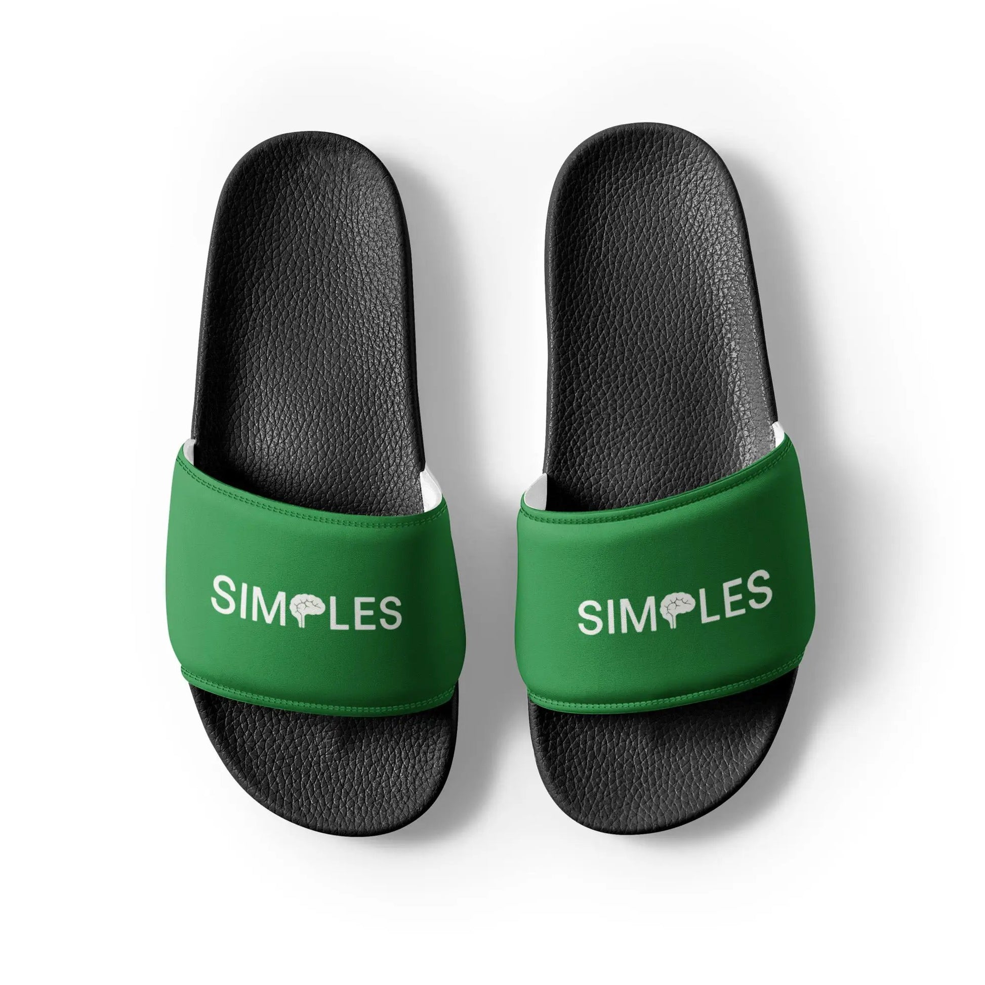 Men’s slides by Simples Market; black textured footbeds with green straps, pair shown.