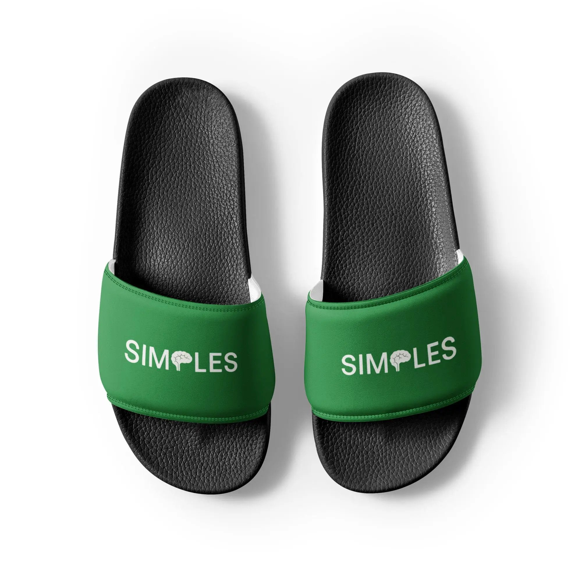 Men’s slides by Simples Market; black textured footbeds with green straps, pair shown.
