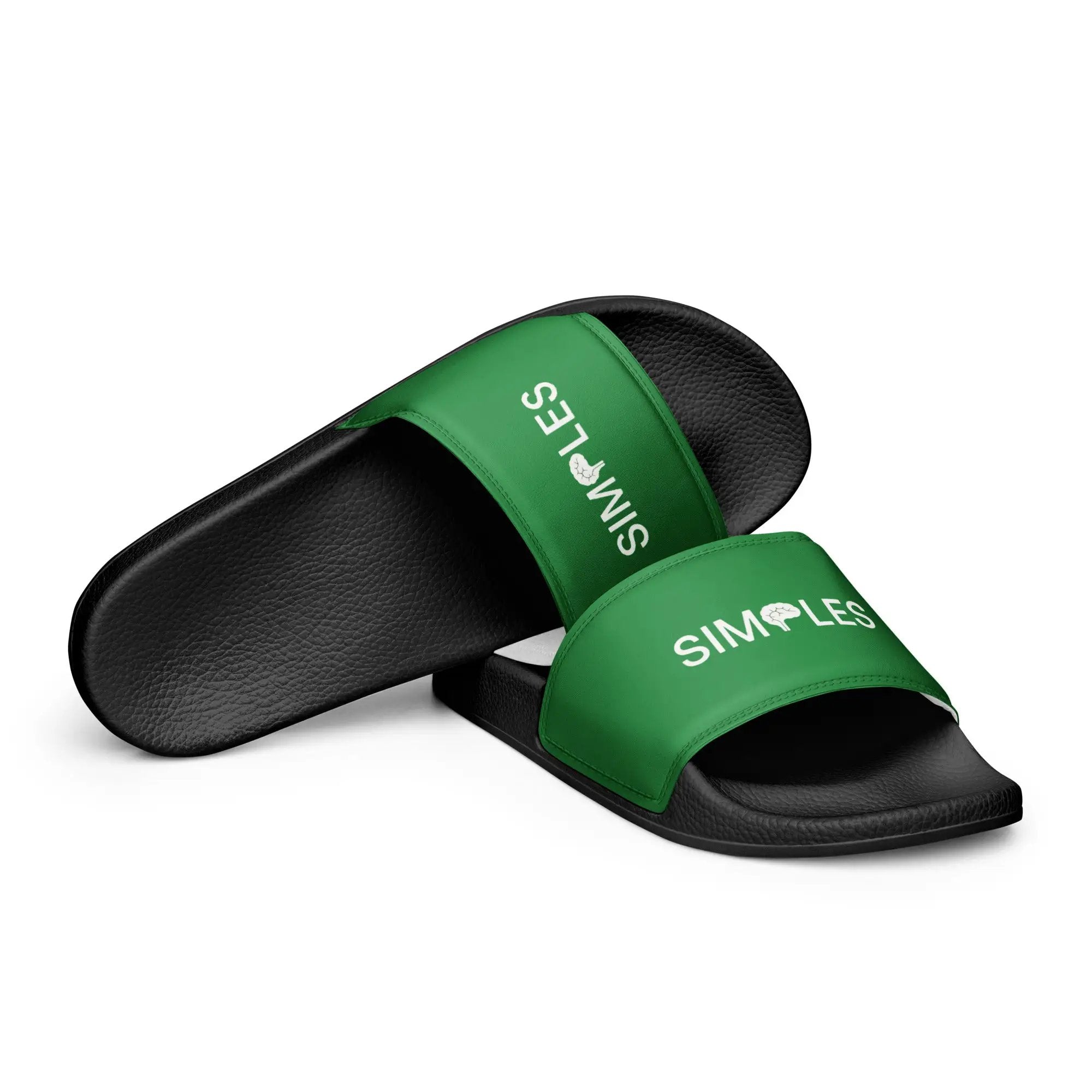 Men’s slides by Simples Market; black textured soles with green straps, pair shown.