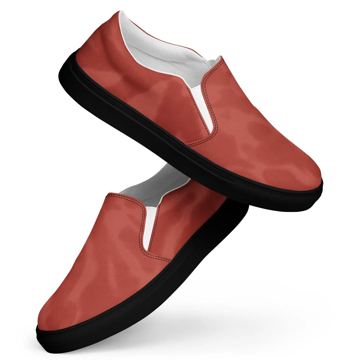 Men’s slip-on canvas shoe by Simples Market, red with white lining and black sole.