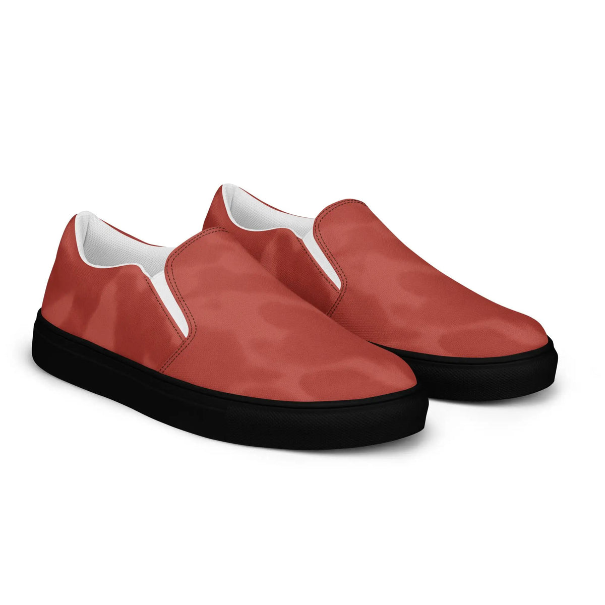 Pair of men's slip-on canvas shoes by Simples Market, red with white trim and black soles