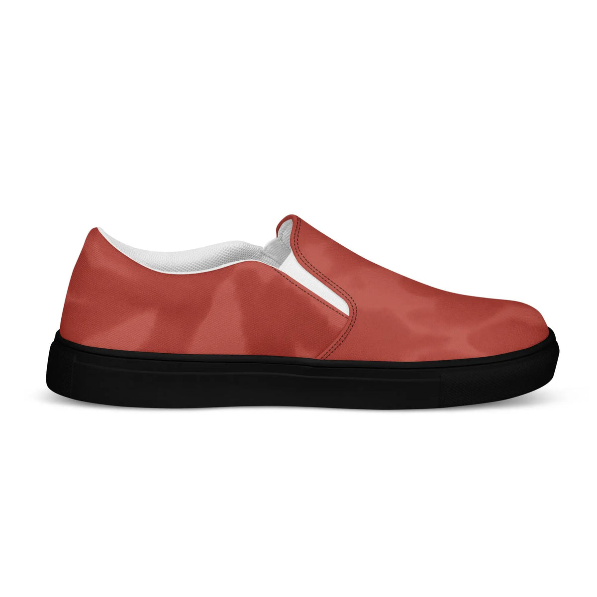 Men’s slip-on canvas shoes by Simples Market in red with white trim and black sole.