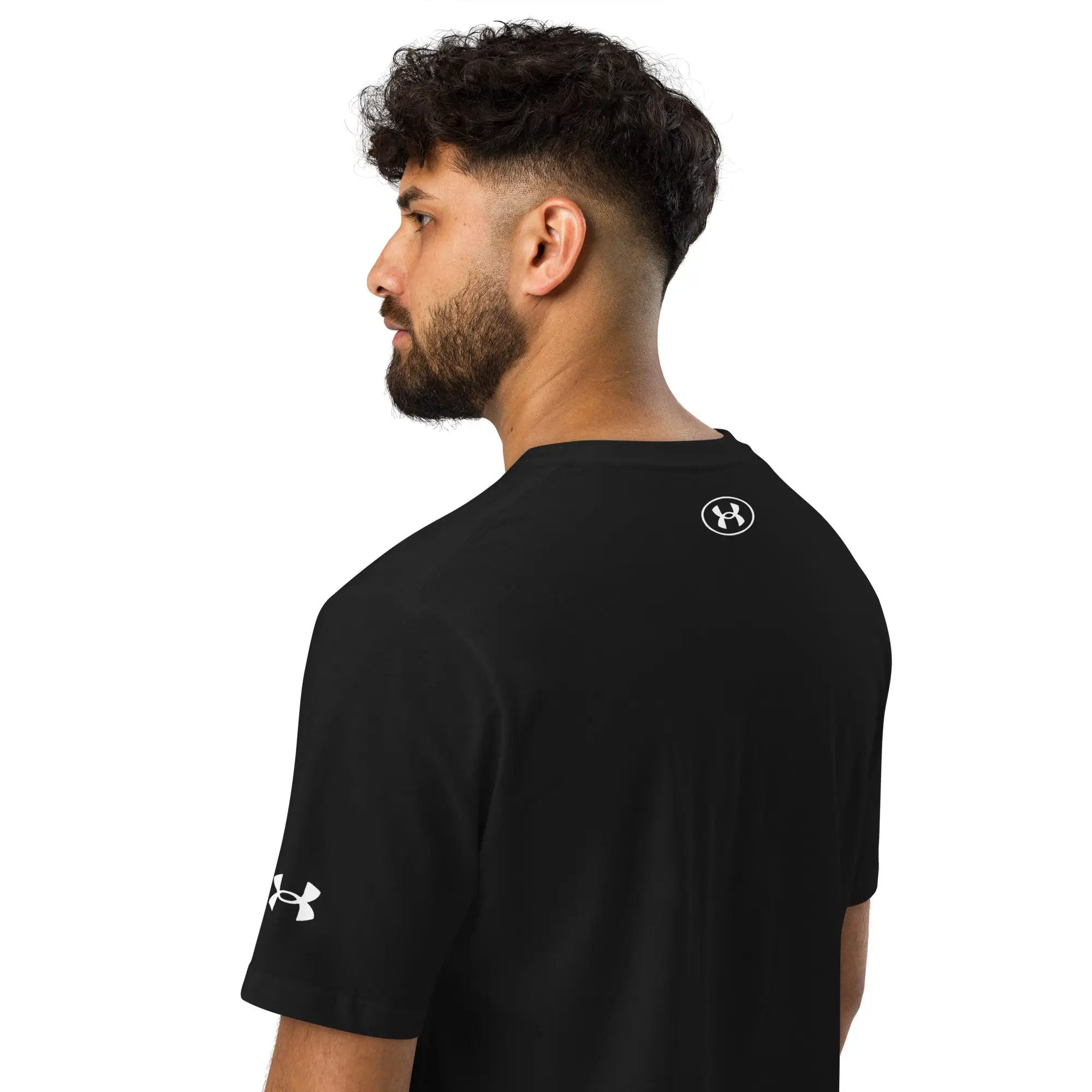 Under Armour athletic black T-shirt with white logo visible on back shoulder.