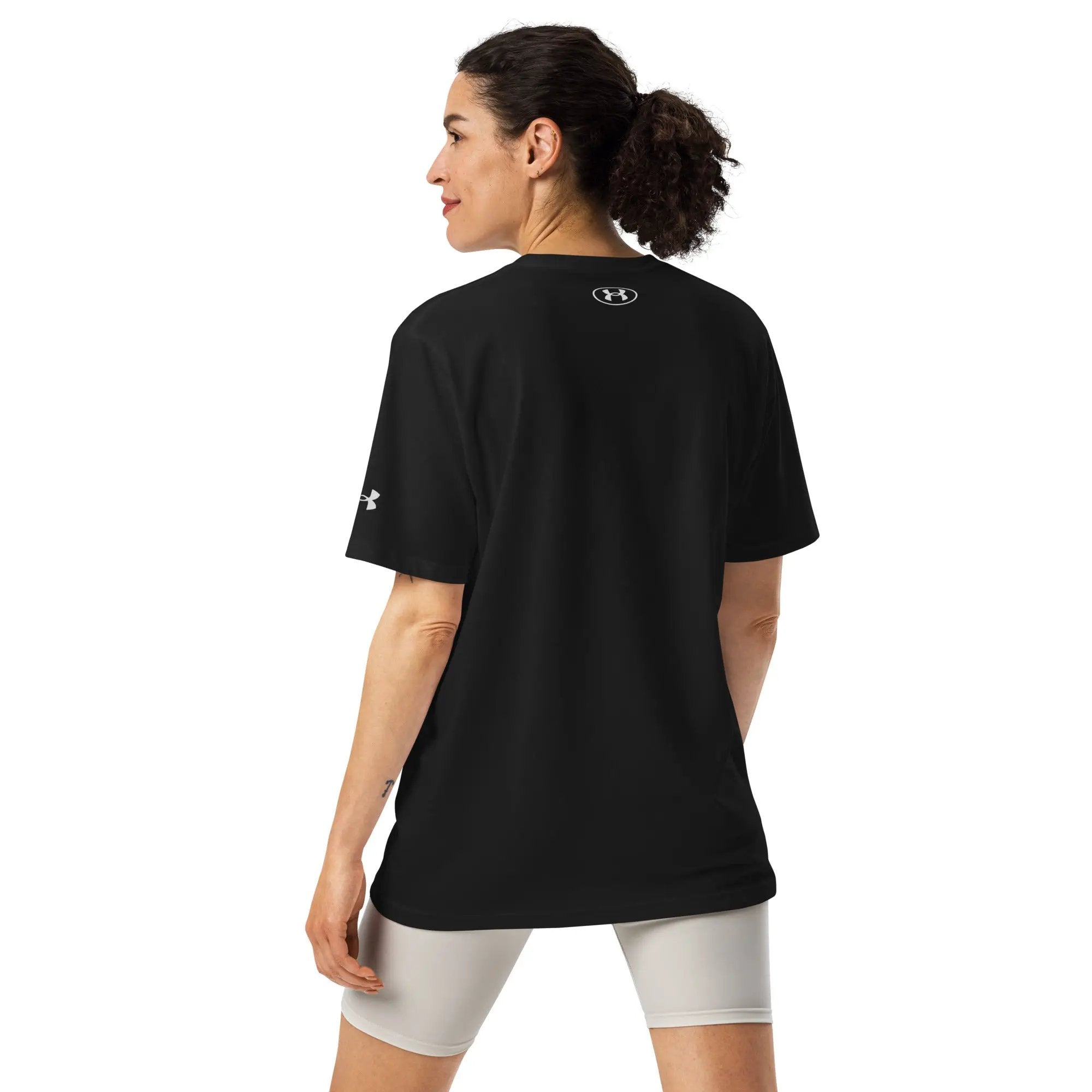 Under Armour athletic t-shirt, black short-sleeve, back view with UA logo on back and sleeve.