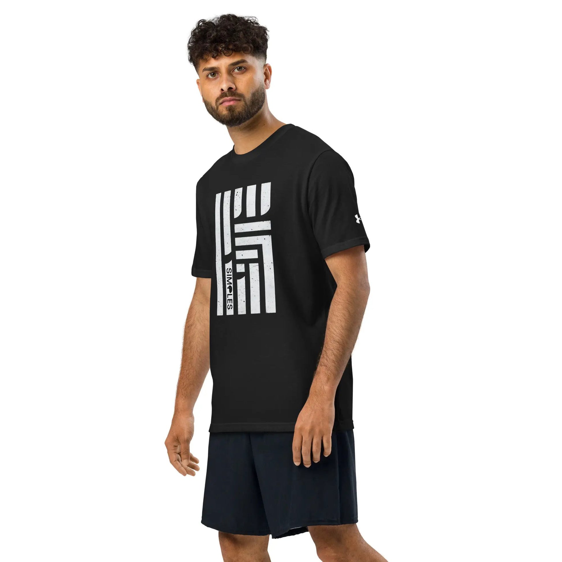 Under Armour athletic t-shirt in black with bold white graphic print on front; UA logo on sleeve.
