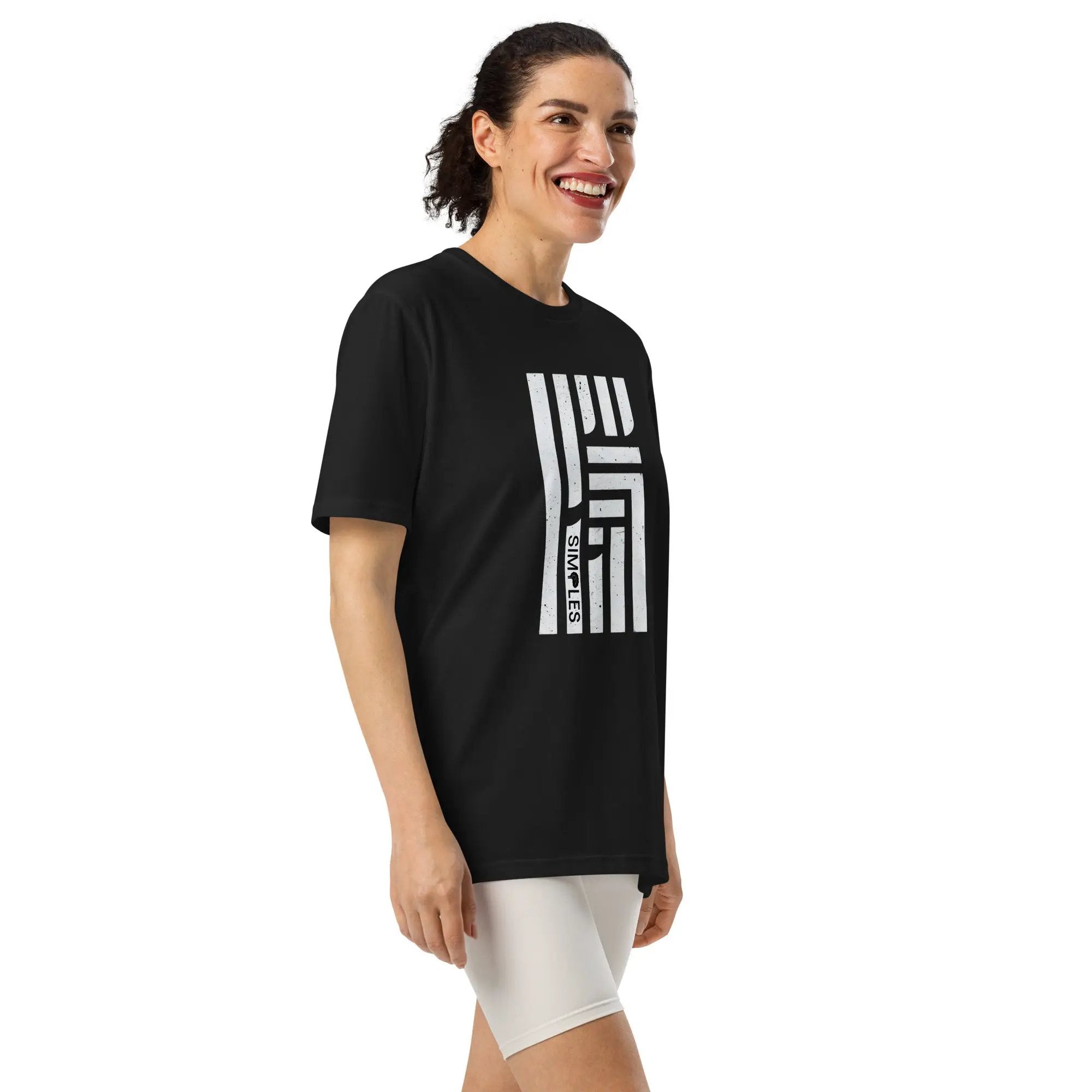 Under Armour athletic t-shirt, black short-sleeve with white vertical stripe graphic on front