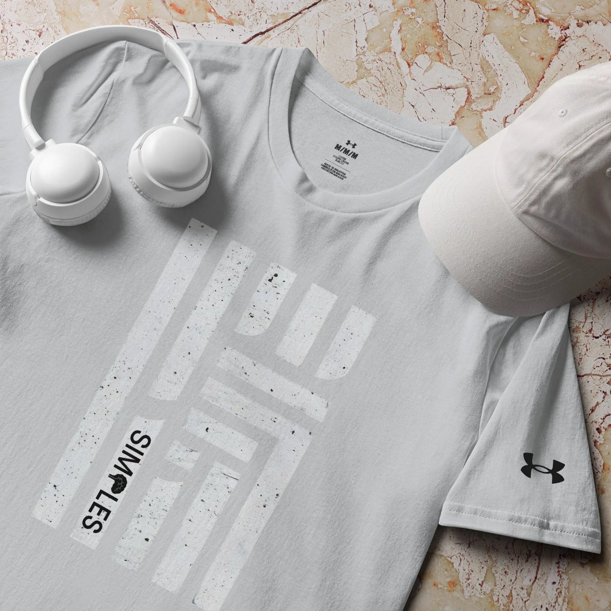 Under Armour athletic t-shirt in light gray with visible UA logo on front