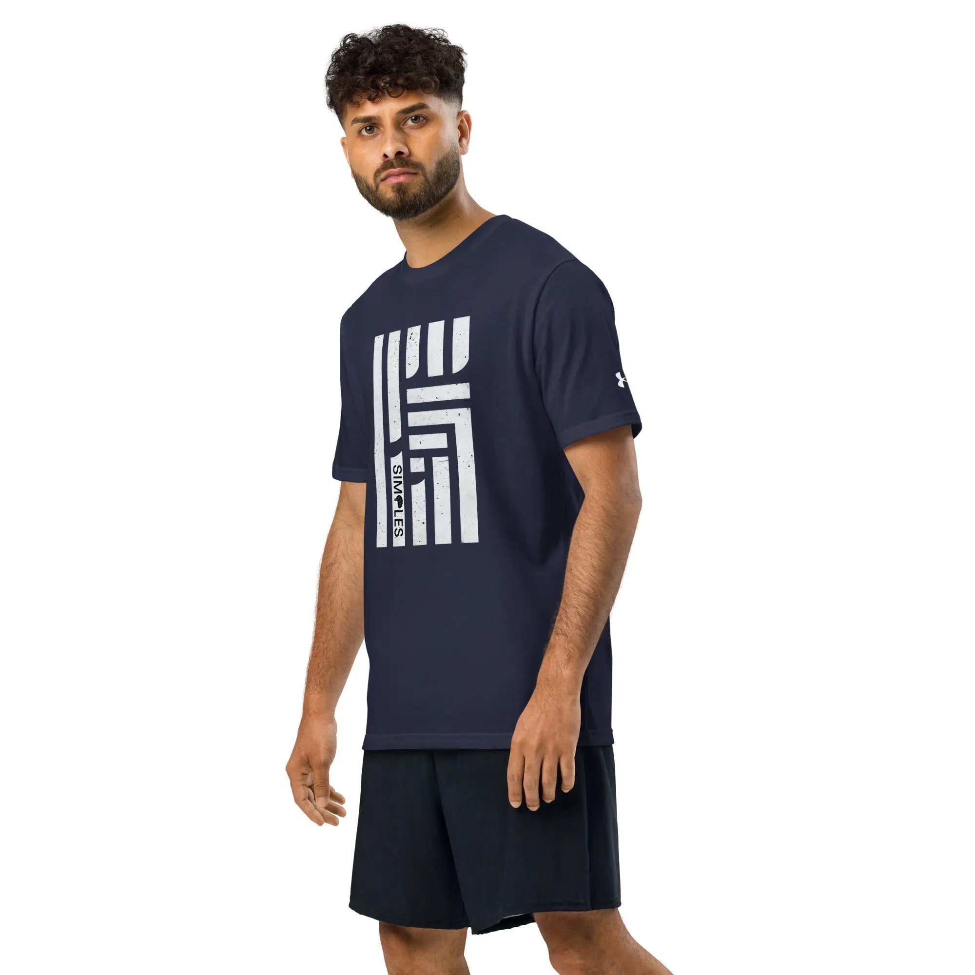 Under Armour navy athletic t-shirt on male model with white graphic print and logo on sleeve.