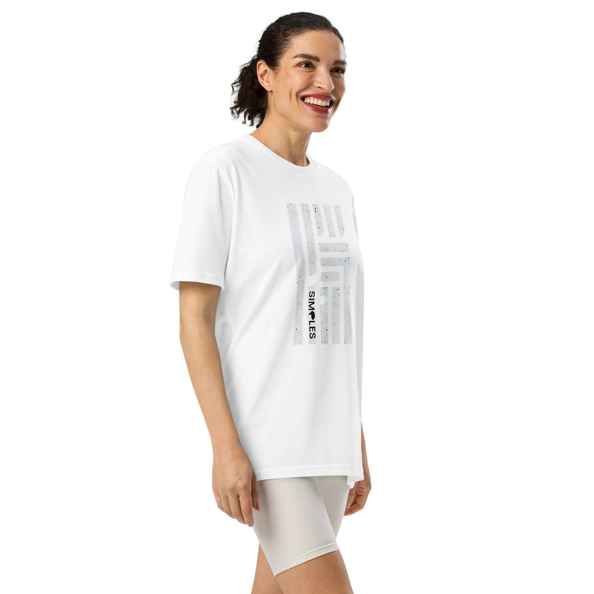 Under Armour athletic t-shirt, white, vertical gray stripe graphic on chest, worn by model
