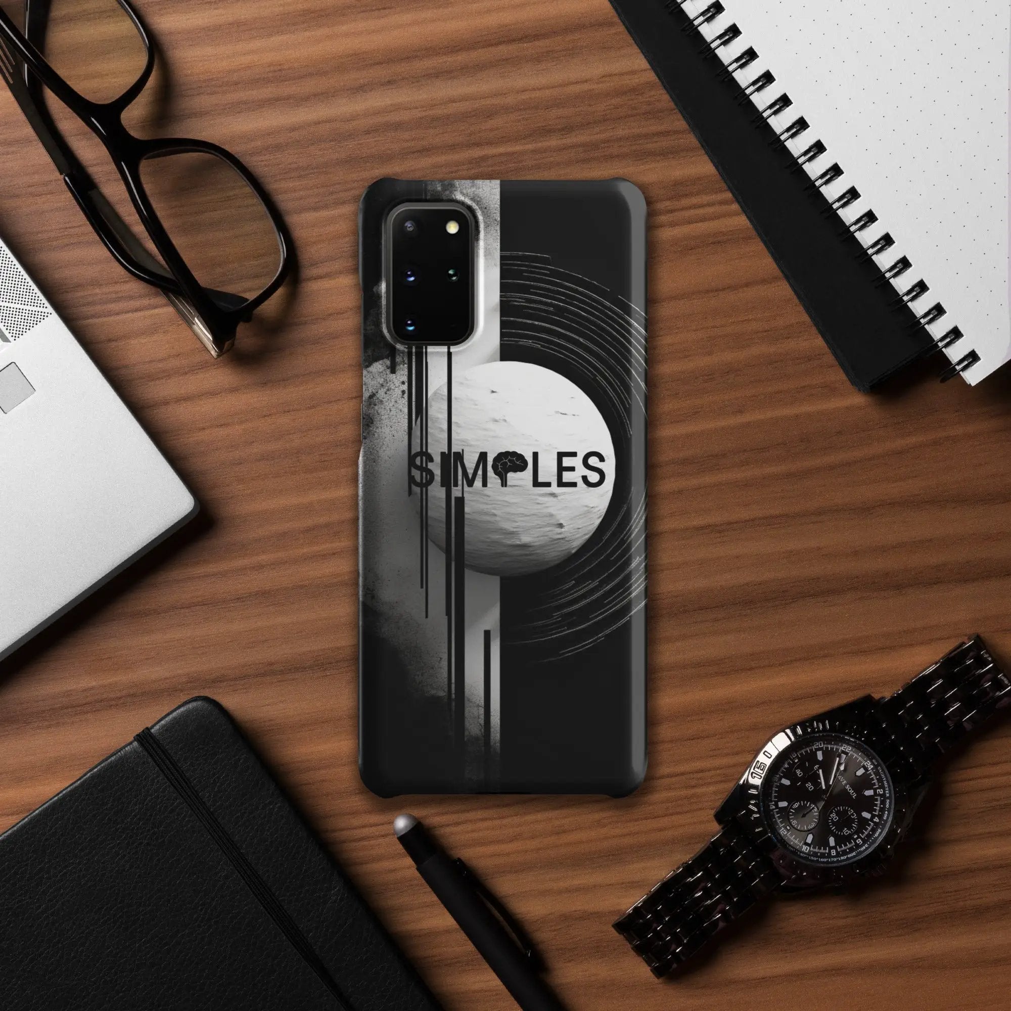 Simples Market Snap case for Samsung, black with circular graphic on back; desk with glasses, notebooks, and a watch