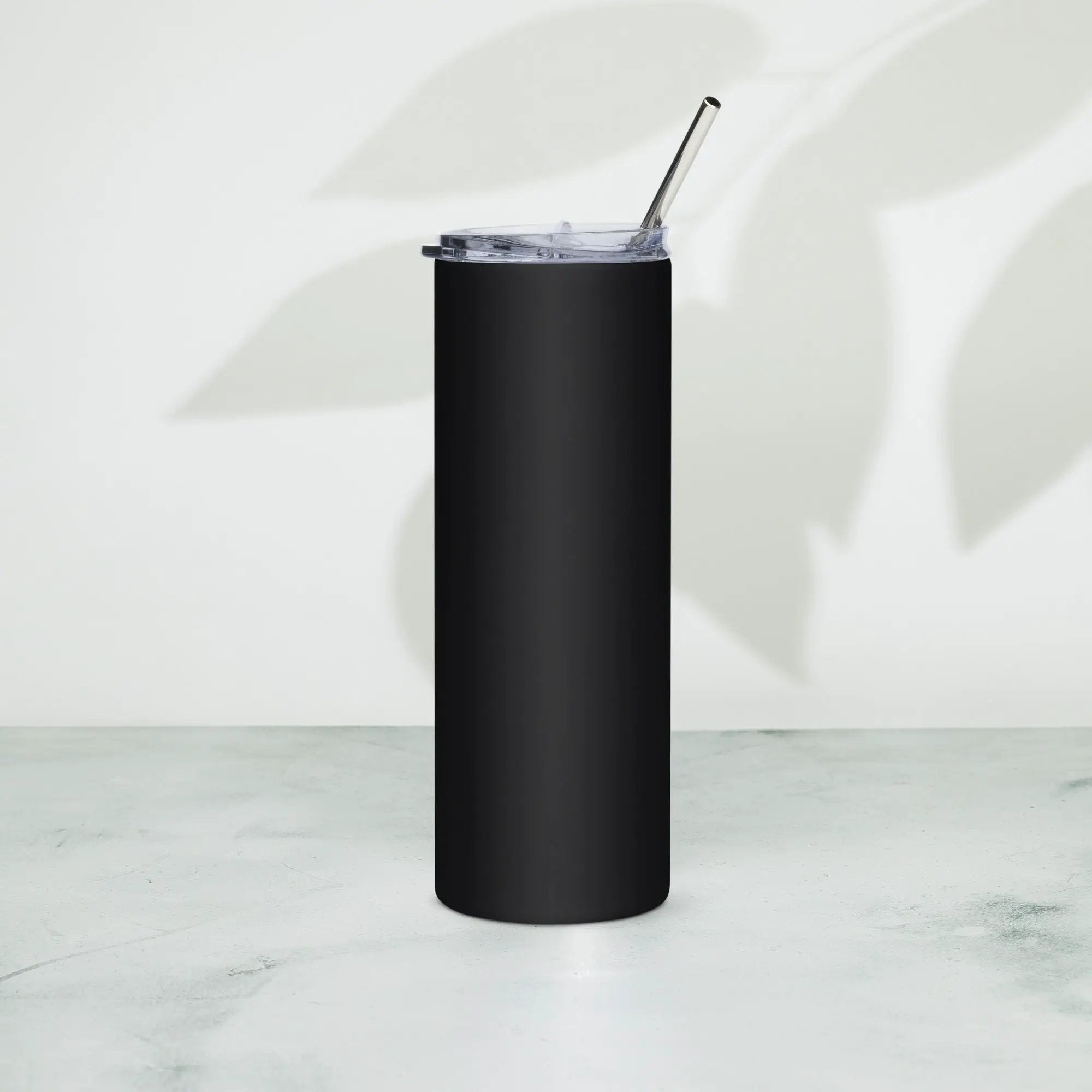 Stainless steel tumbler in black with clear lid and metal straw