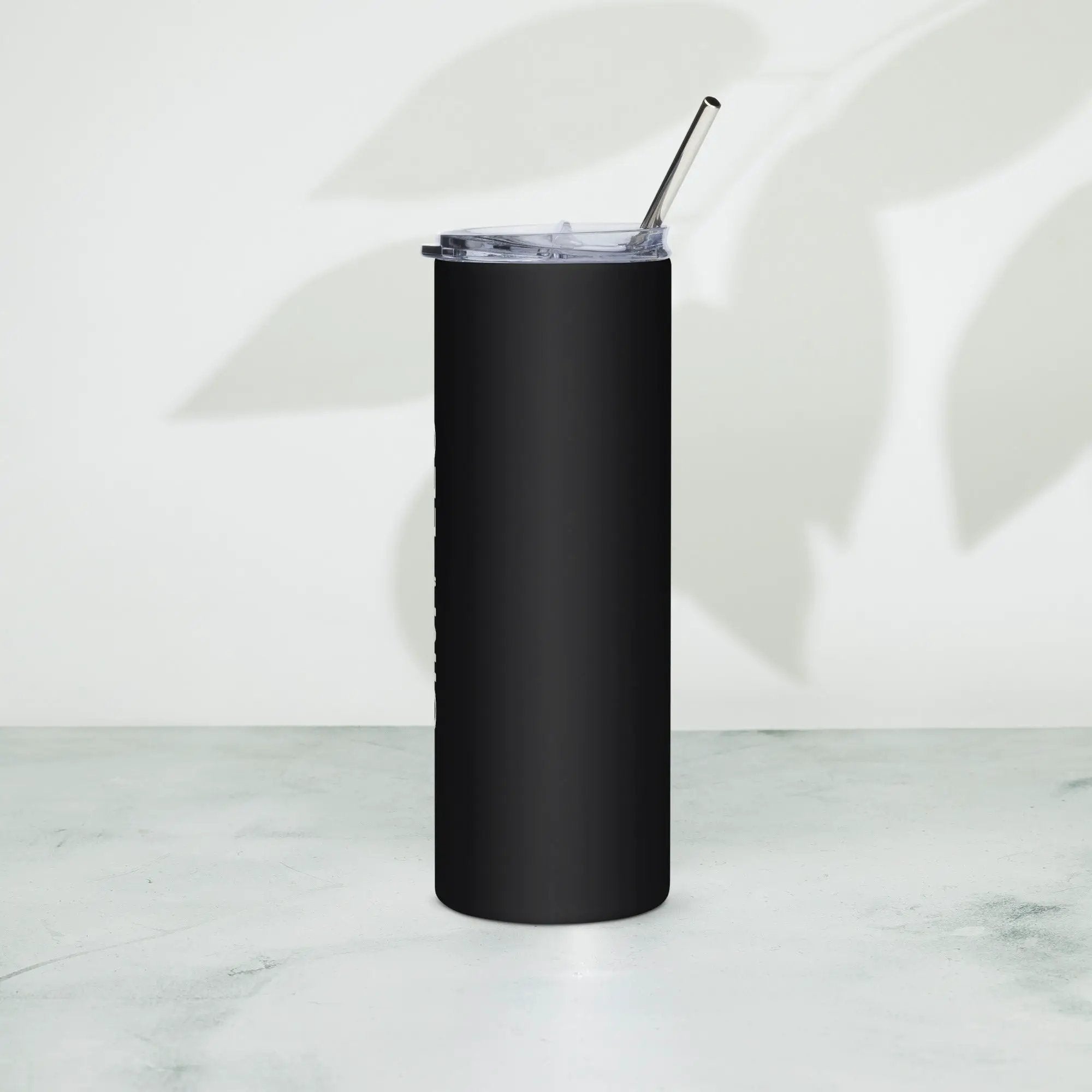 Stainless steel tumbler with black matte finish, clear lid, and metal straw