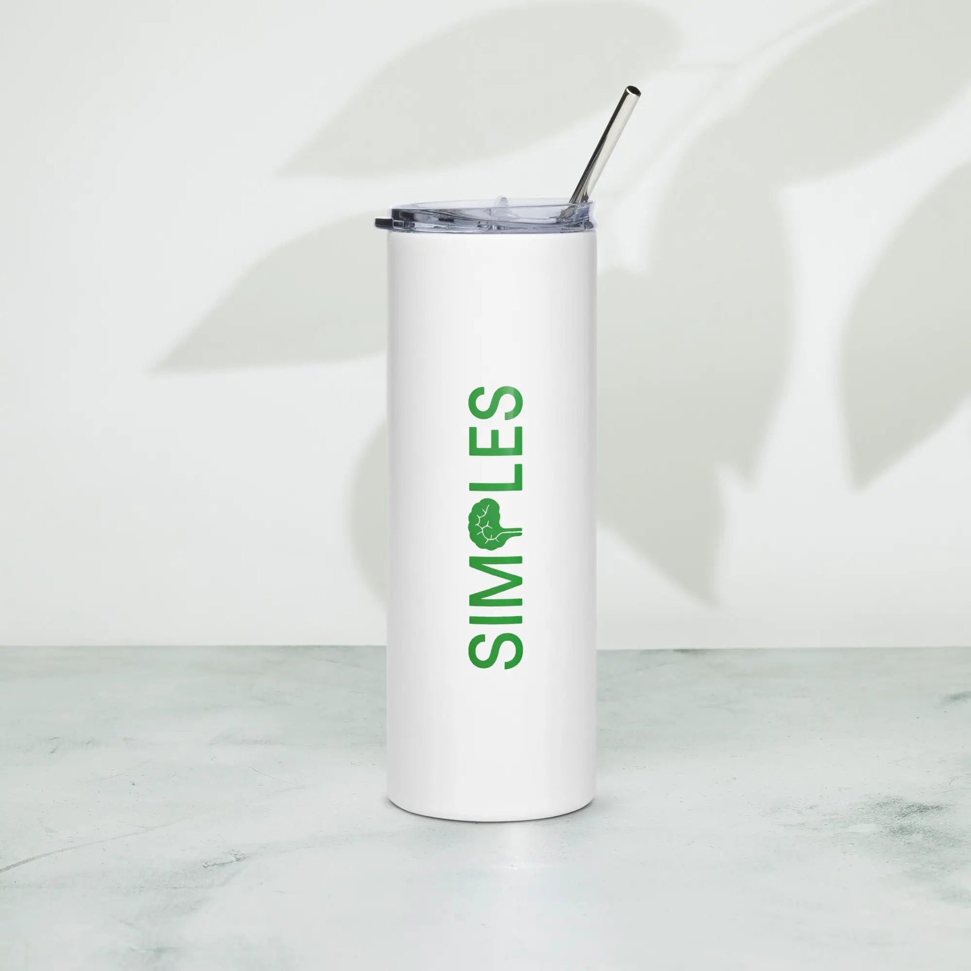 Stainless steel tumbler with white body, clear lid and metal straw by Simples Market