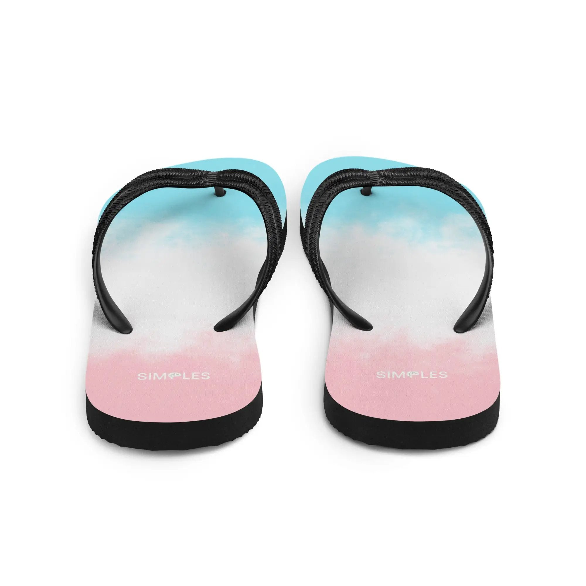 Pair of Simples Market flip-flops in turquoise with textured black straps.