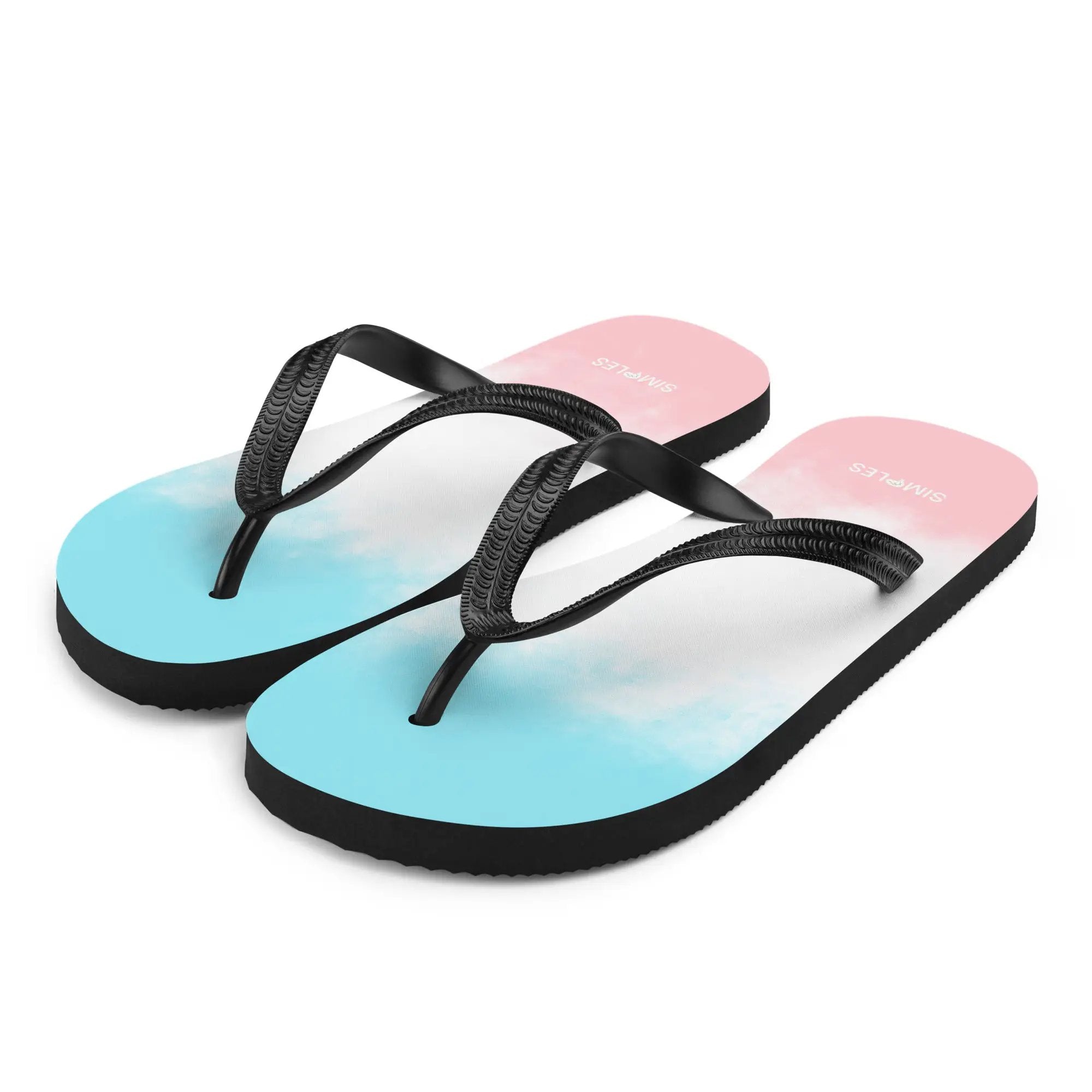 Flip-Flops by Simples Market; pair with blue-to-pink gradient soles and black straps.