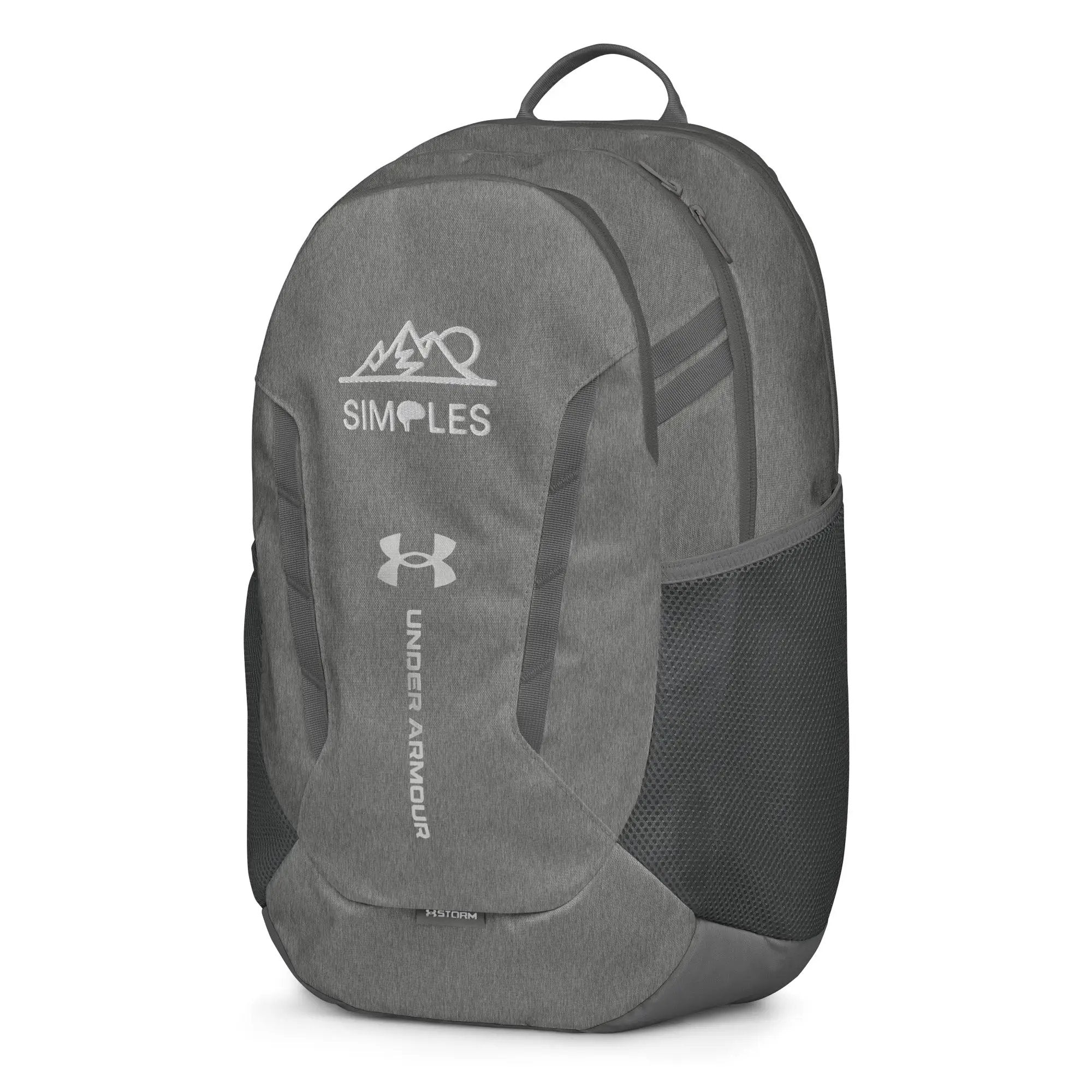 Under Armour backpack, gray fabric with front zip pockets and top carry handle, UA logo visible