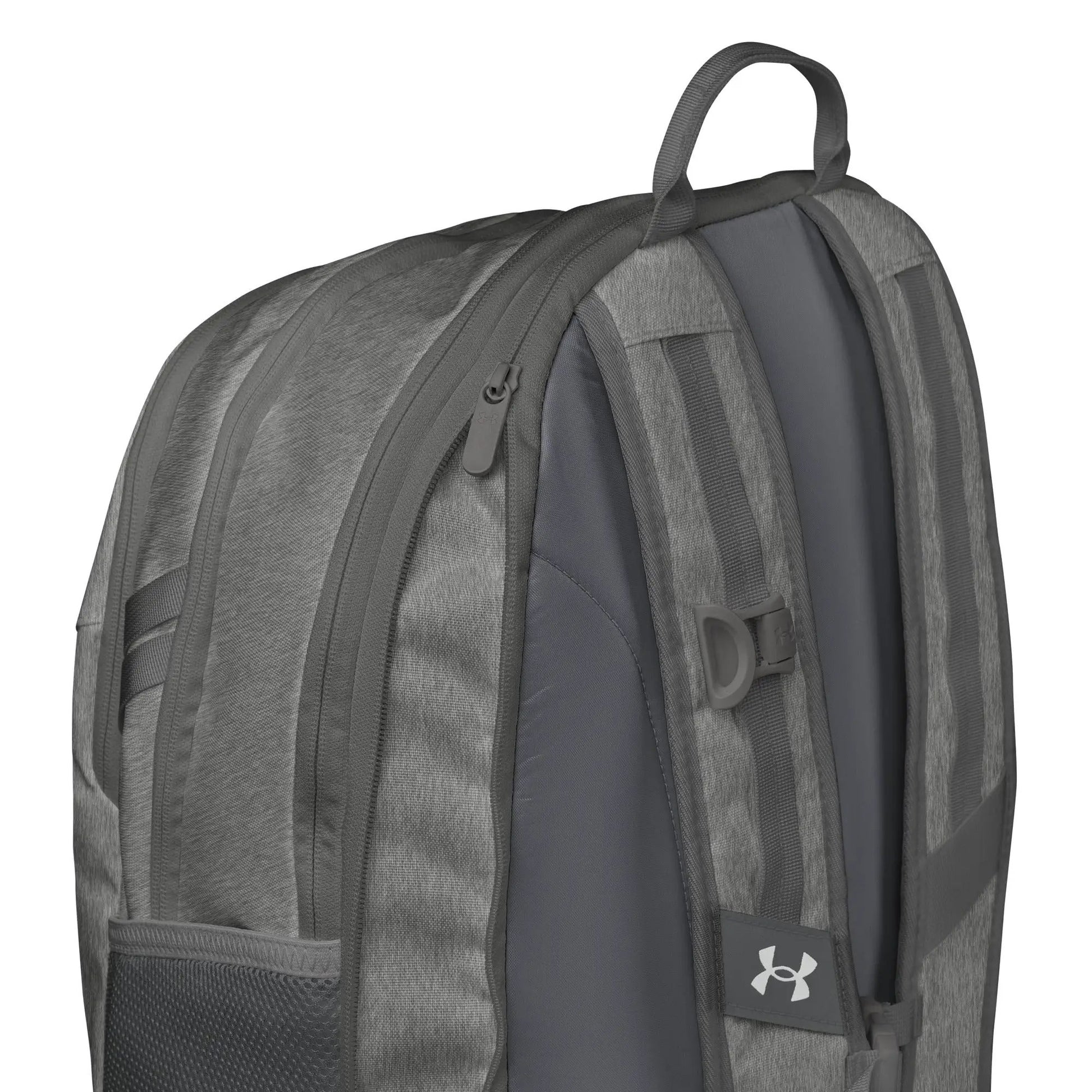 Under Armour backpack in gray heather fabric with top handle and zip pockets, UA logo tag