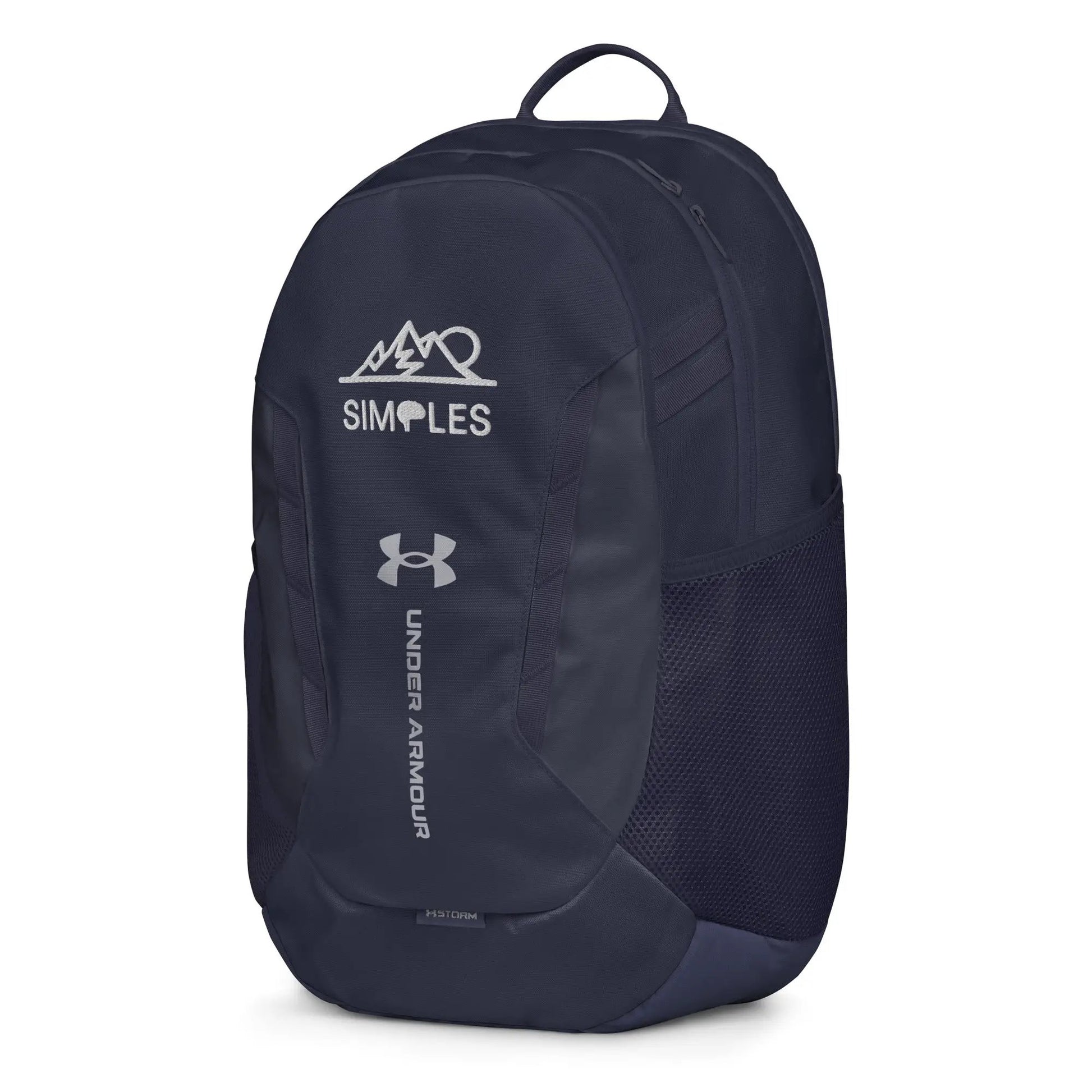 Under Armour backpack in navy with top carry handle, dual zippers, and visible Under Armour logo