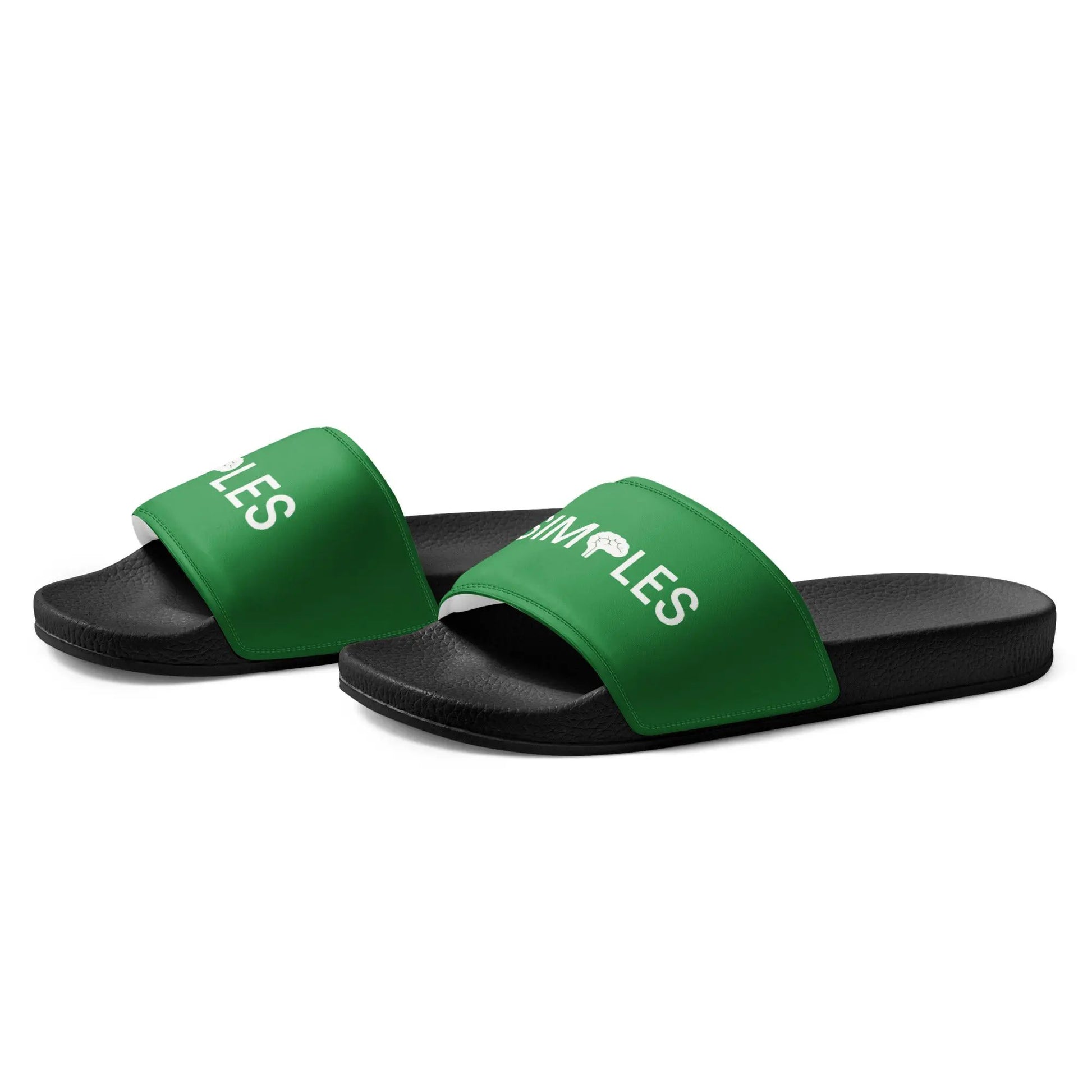 Pair of women's slides with green straps and black soles