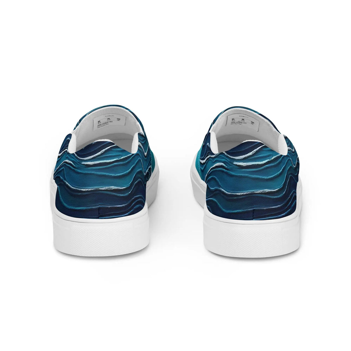 Women’s slip-on canvas shoes by Simples Market in blue marble pattern with white soles.