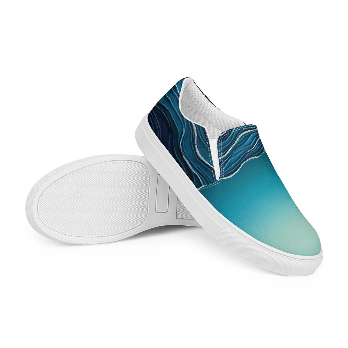 Pair of women's slip-on canvas sneakers by Simples Market in teal-to-navy gradient with white sole